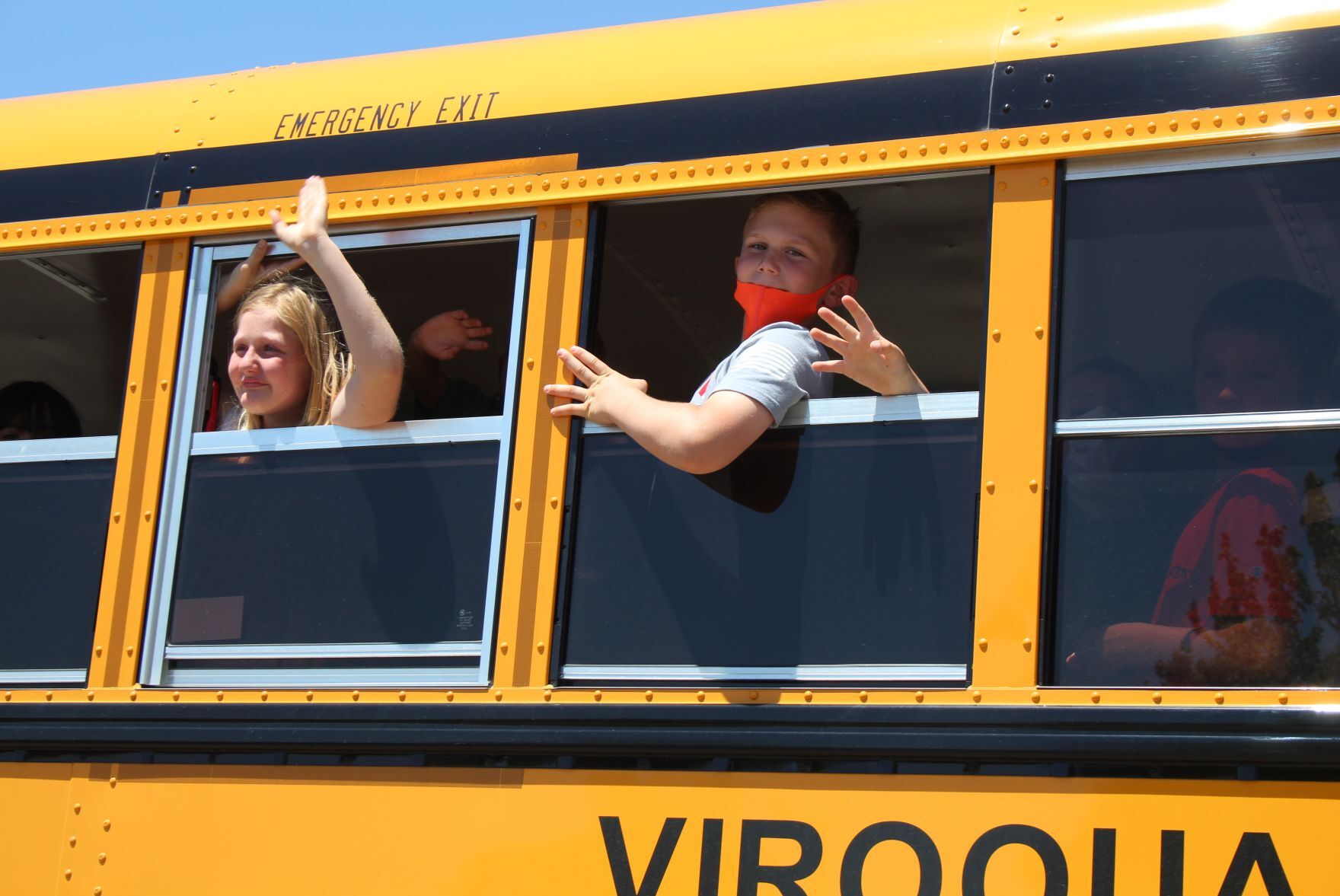 Waving students